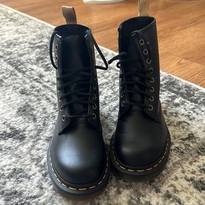 Dr. Martens. Never worn